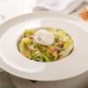 Classic French Lyonnaise Salad with Bacon and Poached Egg