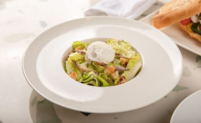 Classic French Lyonnaise Salad with Bacon and Poached Egg