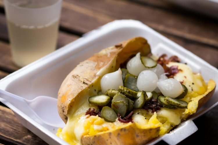 Classic Swiss Raclette with Potatoes and Cured Meats