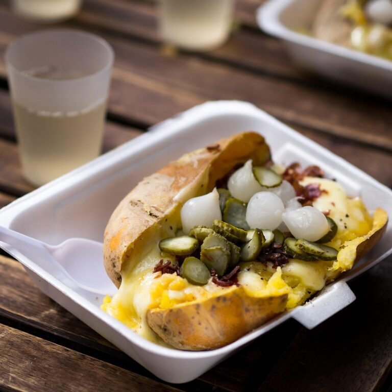 Classic Swiss Raclette with Potatoes and Cured Meats