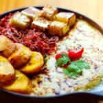 Creamy Mashed Green Plantains with Sautéed Red Onions