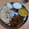Dal Baati Churma (Rajasthani Baked Wheat Dumplings with Spiced Lentils and Sweet Crumble)