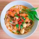 Filipino Batangas-Style Thick Egg Noodle Soup with Pork and Seafood