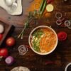 Gujarat-Style Tomato Curry with Crispy Chickpea Noodles