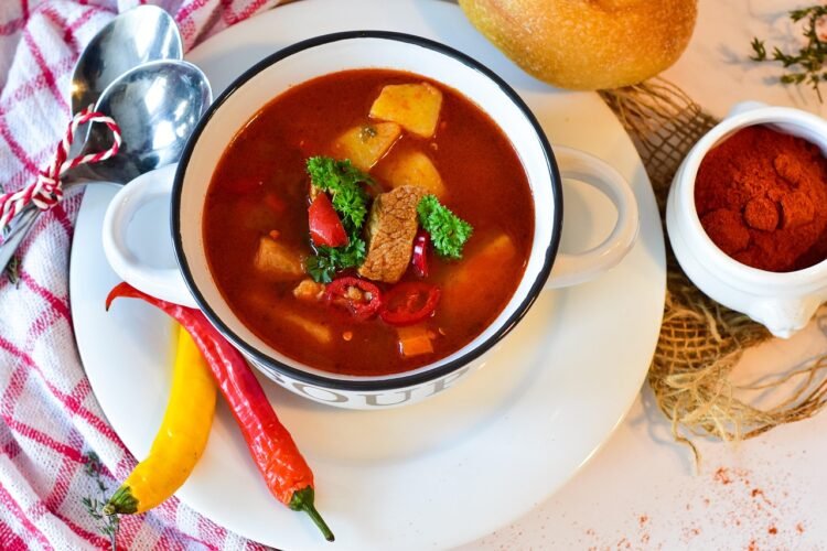 Jalisco-Style Chile-Braised Goat Stew with Consomé