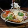 Lao Green Papaya Salad with Padaek and Smoked Catfish