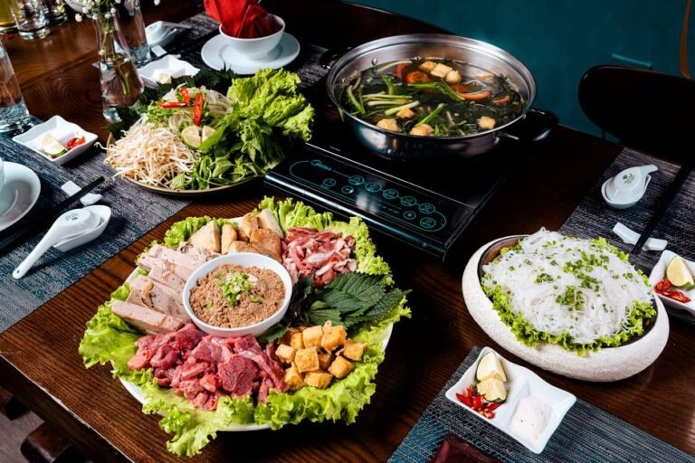 Lao Grilled Beef Hot Pot with Herb Garden and Chili Dipping Sauces