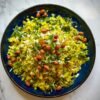 Maharashtrian Flattened Rice with Onions and Peanuts