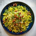 Maharashtrian Flattened Rice with Onions and Peanuts