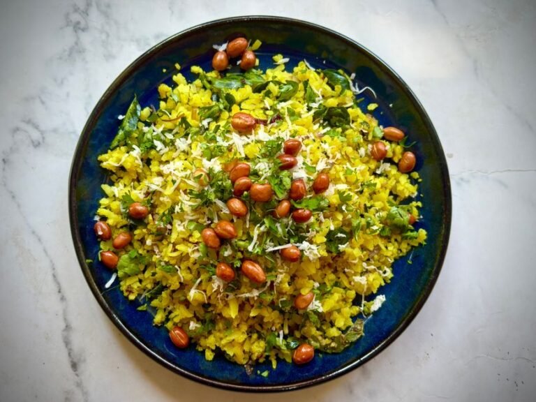 Maharashtrian Flattened Rice with Onions and Peanuts