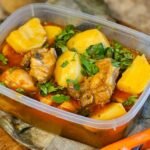 Mozambican Chicken Stew with Palm Oil and Peanuts
