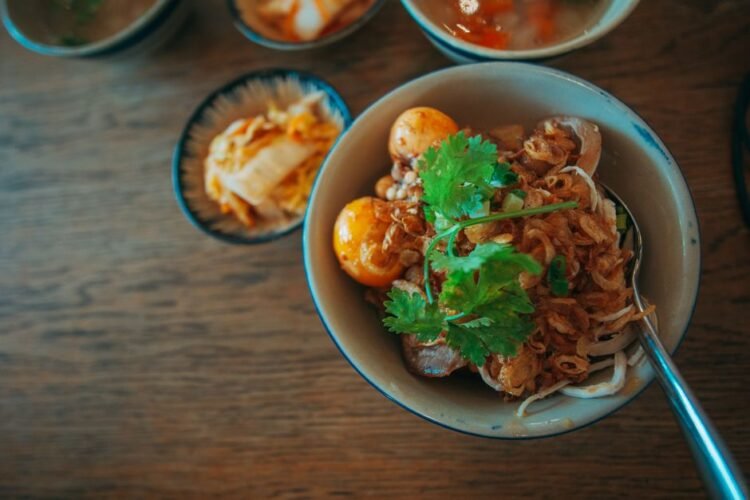 Myanmar-Style Thick Mohinga Noodle Bowl with Toasted Chickpea Garnish
