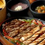 Northern-Style Skirt Steak Fajitas with Grilled Cactus and Melted Cheese
