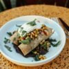 Oaxacan Black Bean-Dipped Tortillas with Chorizo and String Cheese