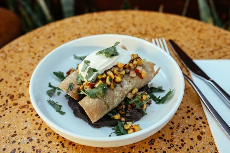 Oaxacan Black Bean-Dipped Tortillas with Chorizo and String Cheese