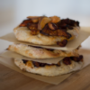 Oaxacan Street-Style Crispy Corn Tortilla with Black Beans and Cheese