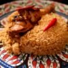 Pakistani Chicken Biryani with Saffron and Crispy Onions