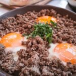 Panamanian-Style Crispy Tasajo Skillet with Eggs, Rice, and Avocado
