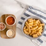 Rigatoni with Broccoli, Crispy Guanciale, and Tomato-Pecorino Sauce
