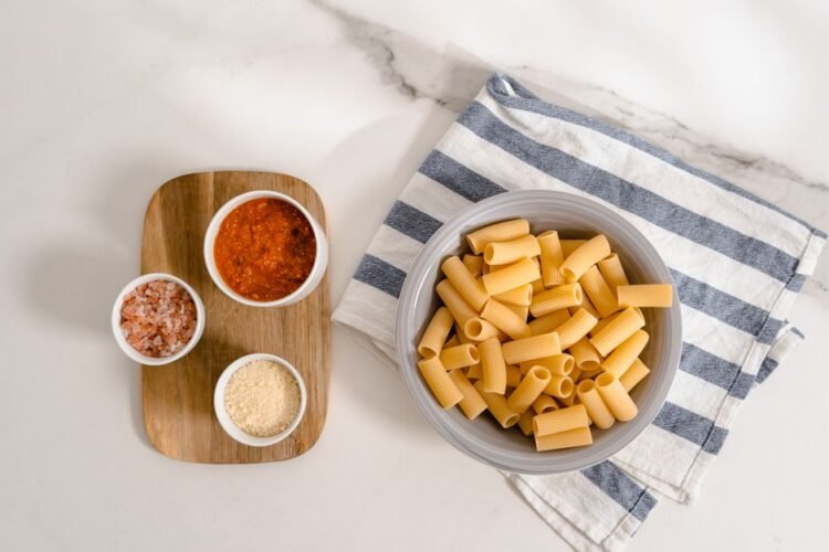 Rigatoni with Broccoli, Crispy Guanciale, and Tomato-Pecorino Sauce