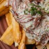 Salvadoran Fried Cassava with Crispy Pork Belly