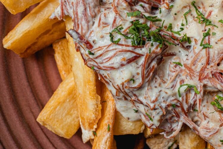 Salvadoran Fried Cassava with Crispy Pork Belly