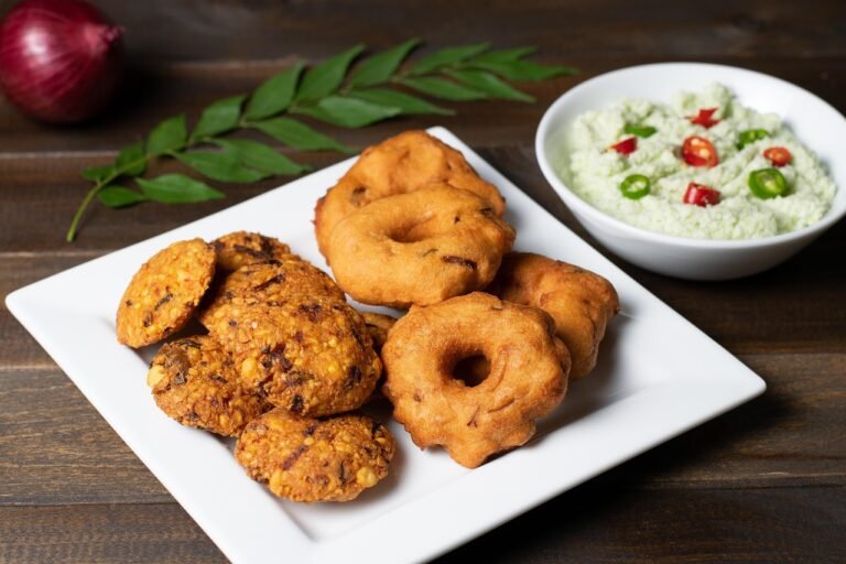 South Indian Sambar Vada (Crispy Lentil Fritters in Tamarind Stew)