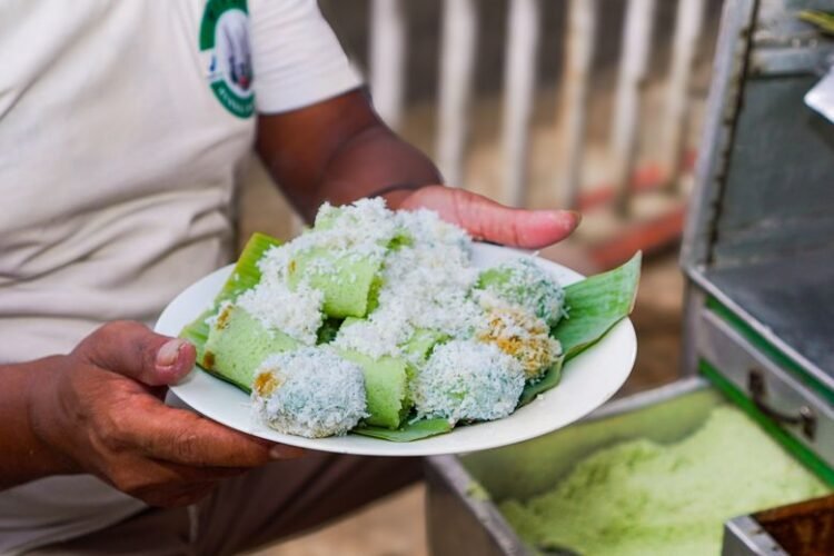 Steamed Banana Leaf Rice Parcels with Coconut and Jaggery