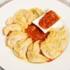 Uzbek Boiled Meat Dumplings in Aromatic Onion Broth