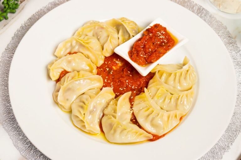 Uzbek Boiled Meat Dumplings in Aromatic Onion Broth