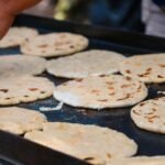 Venezuelan Corn Cakes with Cheese and Black Beans