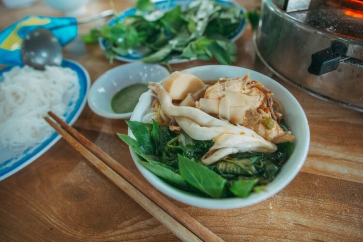 Vietnamese Snail and Tomato Rice Noodle Soup