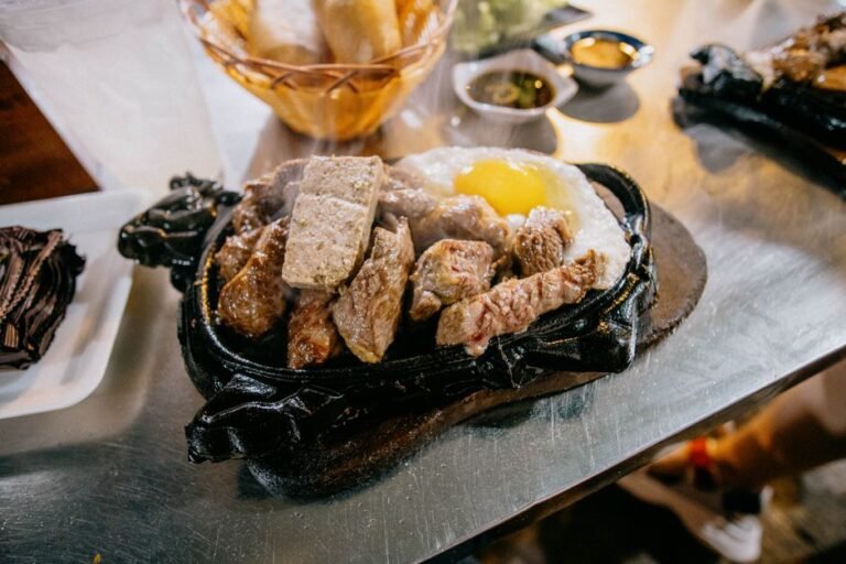 Vietnamese Steak Plate with Fried Egg and Pickled Vegetables