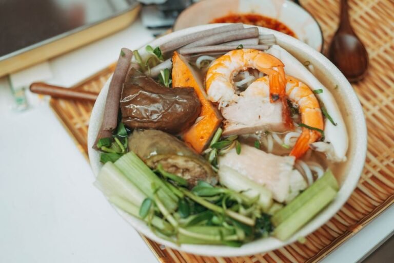 Vietnamese Turmeric Rice Noodles with Pork and Shrimp