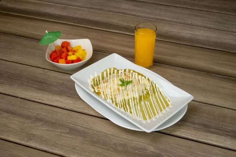Chicken Enchiladas in Creamy Roasted Tomatillo Sauce