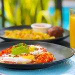 Huevos Rancheros with Charred Tomato Sauce and Refried Beans