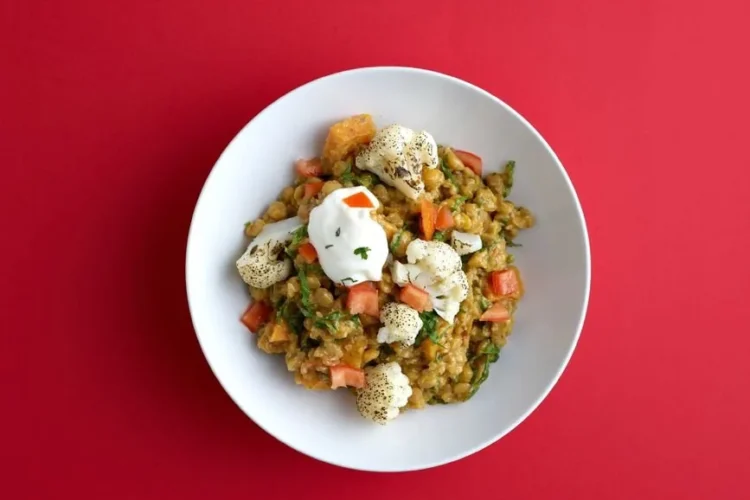 Lebanese-Style Freekeh Bowl with Harissa Cauliflower, Whipped Feta, and Pomegranate
