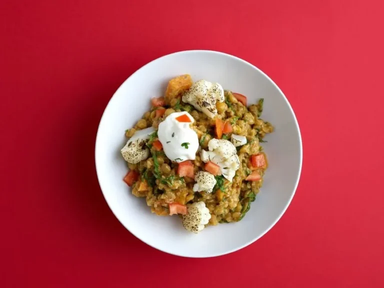 Lebanese-Style Freekeh Bowl with Harissa Cauliflower, Whipped Feta, and Pomegranate