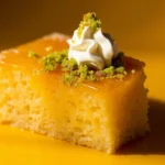 Bahraini Saffron Semolina Cake with Cream and Pistachio