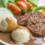 Classic American Meatloaf with Savory Onion Gravy