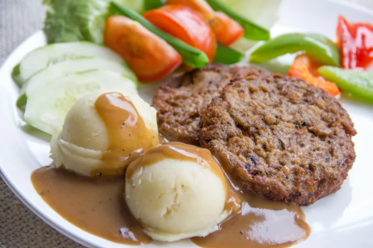 Classic American Meatloaf with Savory Onion Gravy