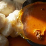 Fufu with palm nut soup