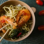 Malaysian Wok-Fried Egg Noodles with Seafood and Pork Belly