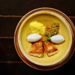 Barbados Flying Fish with Cou Cou and Pepper Sauce