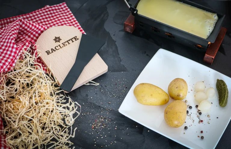 Classic Swiss Raclette with Potatoes and Cured Meats