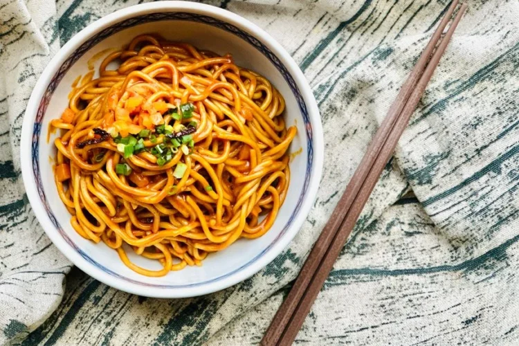 Hand-pulled noodles in chili oil with scallions