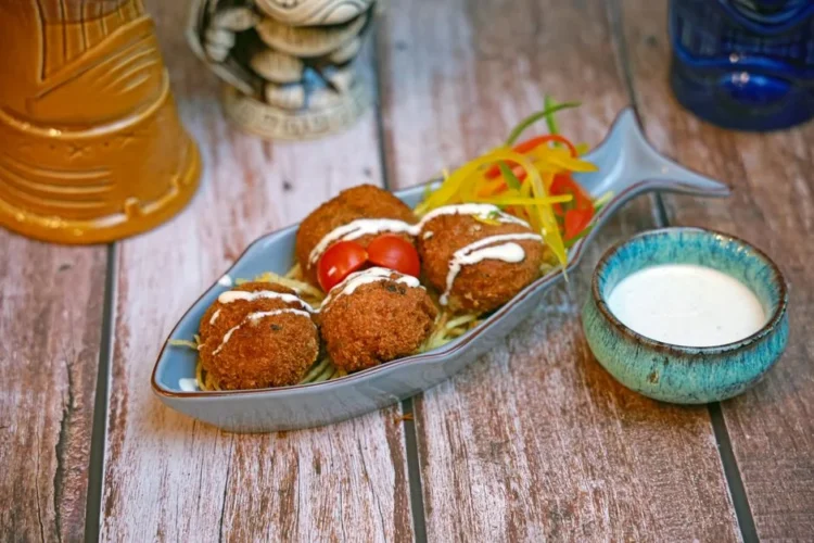 Fried salt cod fritters with dipping sauce