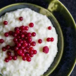 Creamy rice pudding with red berries
