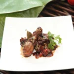 Filipino vinegar-braised roast pork stew