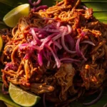 Yucatan slow-roasted achiote pork cochinita pibil with pickled onions